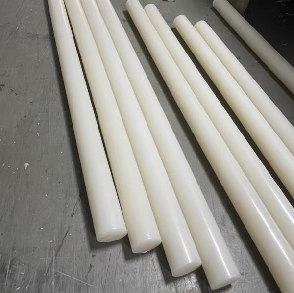 50 KJ/M2 Impact Strength Nylon Plastic Rod with 80°C Heat Deflection Temperature and 2.5%-2.8% Moulding Shrinkage for Industrial Applications