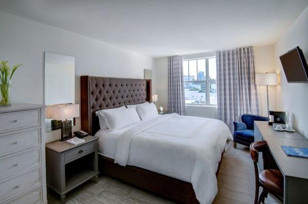 Da Nang hotel American style bedroom furniture set by Fabirc upholstered queen bed with leisure armchairs and wood table