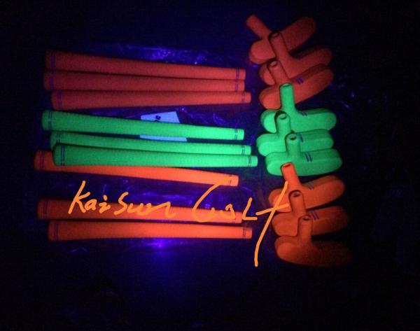 mini fluorescent golf putter in black light (glow in uv light ), mini golf putter