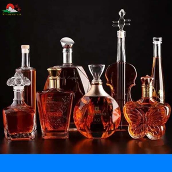 Highly OEM/ODM Customized 1000ml Clear Glass Bottles for Brandy Whisky Liquor Packaging