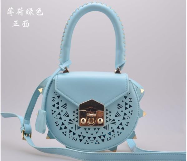 2016 Korean version of the new shoulder bag female fashion rivets hollow pattern portable diagonal package