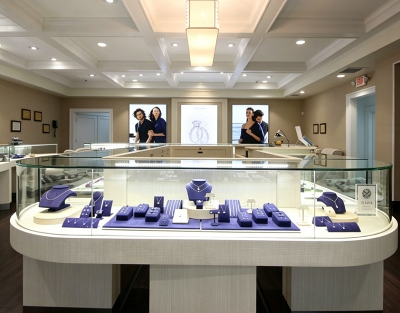 Modern White Textured Oval Jewelry Store Interior Design, Complete Turnkey Fixture Package with Central Island Showcase