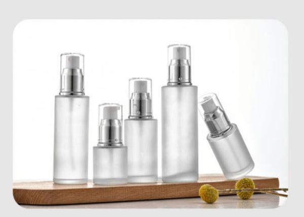 1 Ounce Glass Spray Cosmetic Pump Bottle With Silver Caps User Friendly