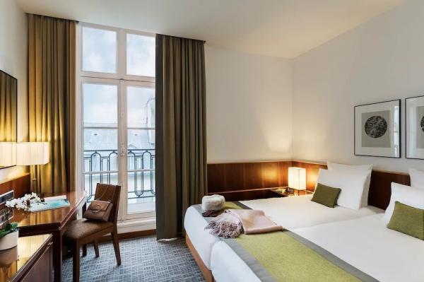 Madagascar hotel bedroom furniture set of wood headboard bed with combine desk table and fabric cushion chairs