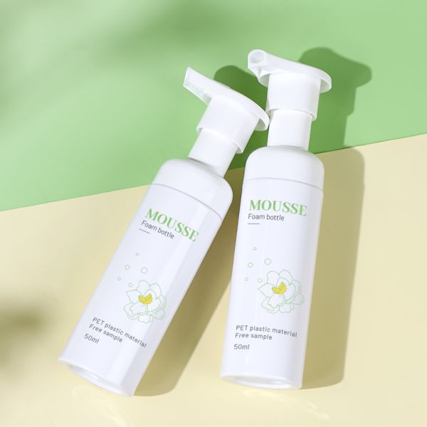 Botella de bomba de espuma PET de calidad alimentaria con cabeza de bomba de presión y diseño a prueba de polvo para productos de cuidado personal