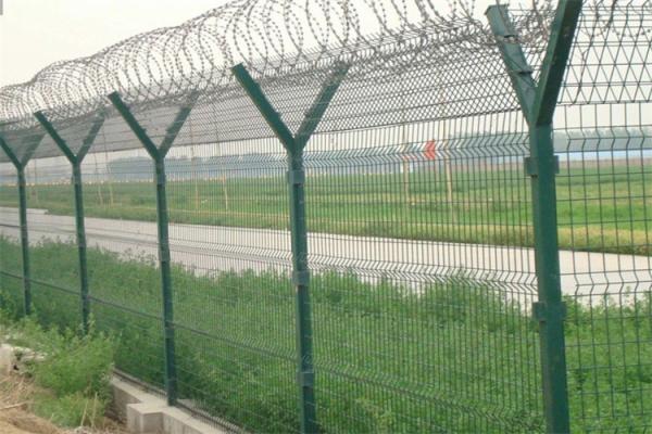 High Security Concertina Razor Wire On The Top Of Airport Perimeter Security Fencing
