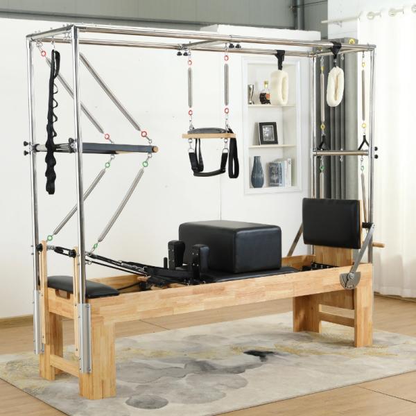 Cheap price Malaysian oak wood pilates reformer with half trapeze