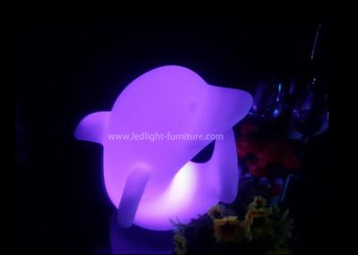 O candeeiro de mesa colorido bonito da luz da noite do golfinho do feriado Eyes a produção para a sala