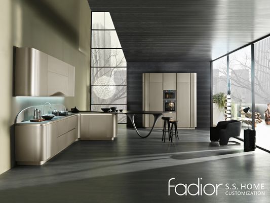 Champagne Stainless Steel Kitchen with Curved Sculptural Island