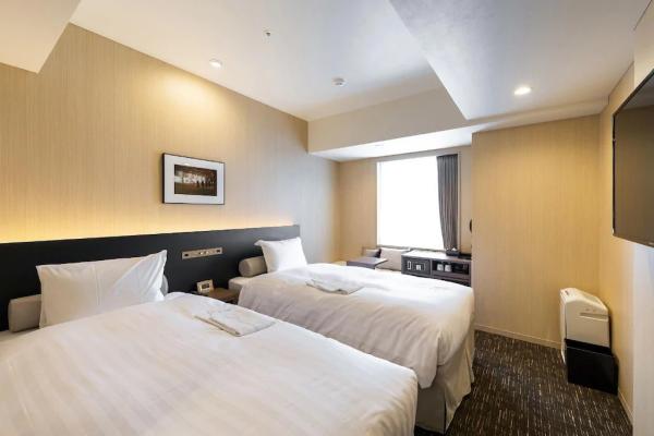 Auckland hotel inn resort Laminate wood headboard bed with in wall cabinet and TV panel stand