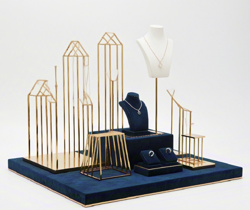 Modern Geometric Jewelry Display Stand with Navy Blue Velvet Lining and Brushed Gold Metal Frame