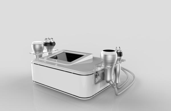 FDA/CE approved 4 handles 100 w 40 K focused cavitation tripolar multipolar bipolar rf machine for beauty spa