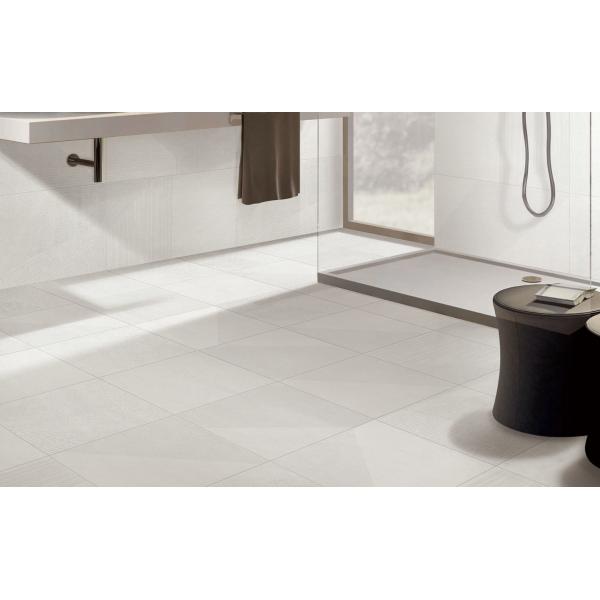 Мрамор плиток фарфора современной стены крытый на открытом воздухе выглядит как серый цвет