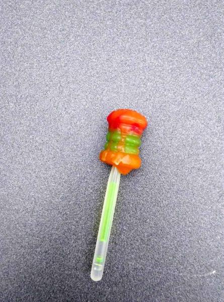 Doces duros saudáveis da forma engraçada do pirulito do tornado do fruto doces e deliciosos