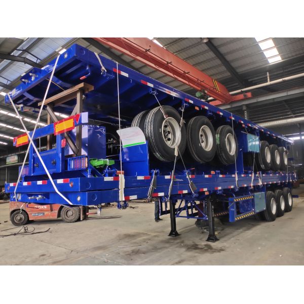 Overall Dimension 12500mm 2500mm 1530mm Flat Bed Semi Trailer Equipped with 12 Wheels Transporting Large Heavy Goods