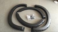O para-choque da roda do estilo do bolso de Bushwacker alarga-se para Ford F-250