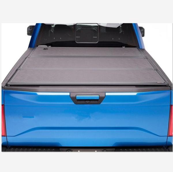 Tampas de cama dobráveis em três partes duras de alumínio do caminhão do favo de mel do OEM de Wholesale do fabricante para Toyota Hilux Dmax F150