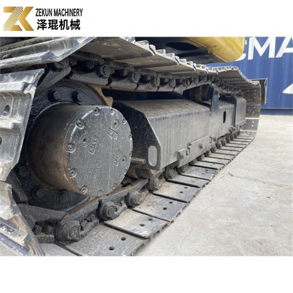 Mini escavadeira Komatsu PC56-7 com 5 toneladas de peso operacional e motor diesel durável