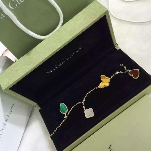 4 ouro amarelo afortunado do bracelete 18k de Alhambra dos motivos com a pedra do olho da cornalina/tigres