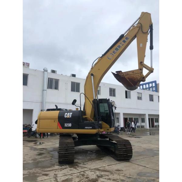 Подержанный экскаватор CAT 323 с буровыми машинами
