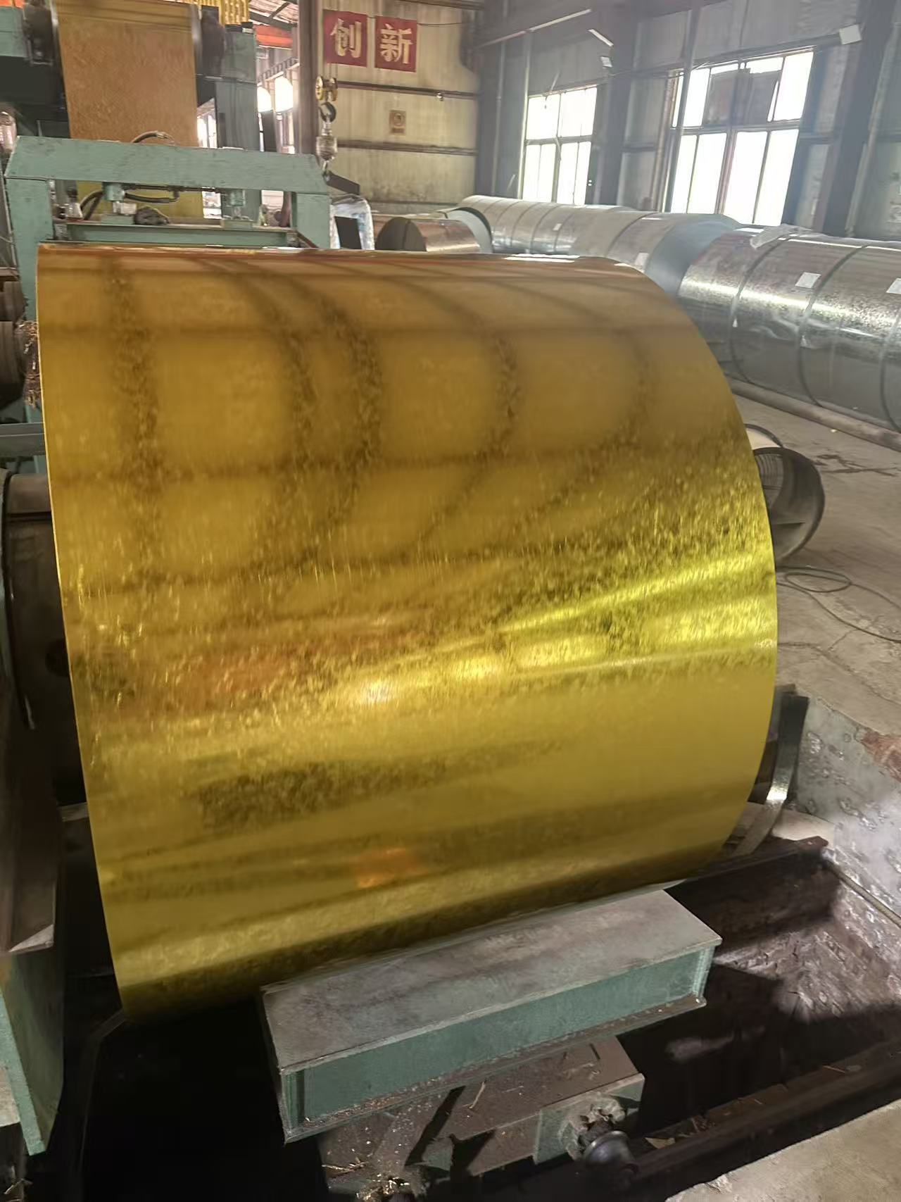 Transparent Yellow 740*0.5 Color-Coated Steel Strip Corrosion and Rust Resistance. It features dual protection of base plate and organic coating, offering excellent water vapor resistance, oxidation r