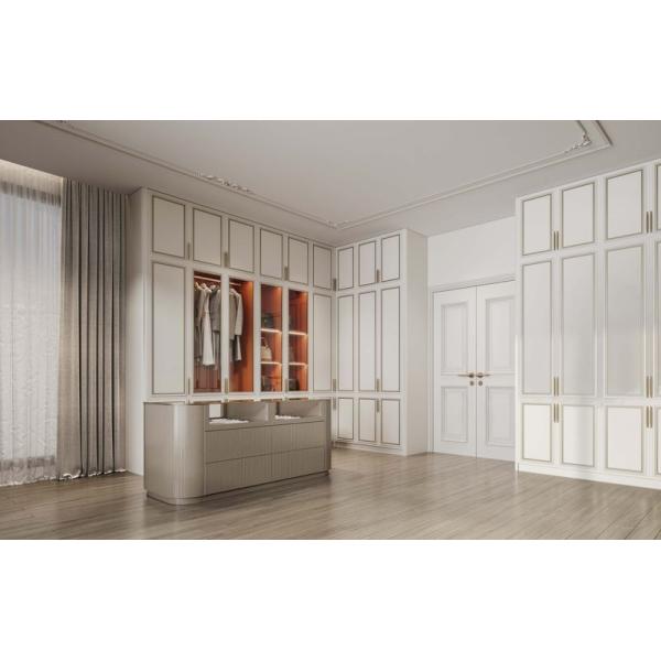 French Style Custom Walk-In Closet with Cream Doors & Gold Trim