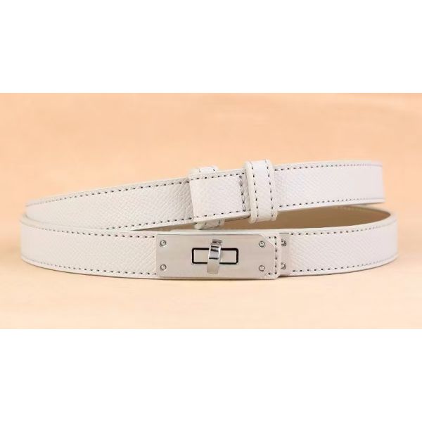 Adjustable belt, alloy buckle, leather texture, fashion accessory, minimalist design, skirt accessory, dress accessory