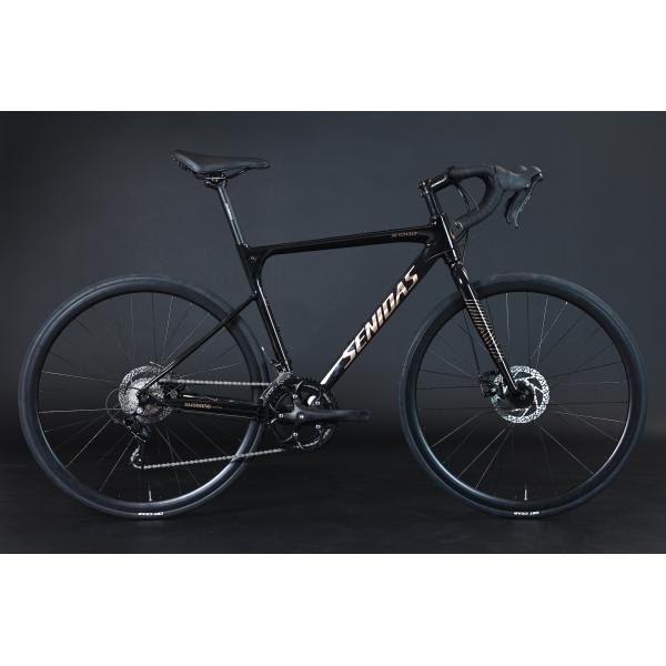 Vélo routier soudé en fibre de carbone 700C 2*9s 1*9s AL Cadre jolie forme AL Hub et 10kg