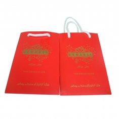 La corde de papier sensible rouge professionnelle a manipulé le service d'impression de sac de transporteur pour l'achat