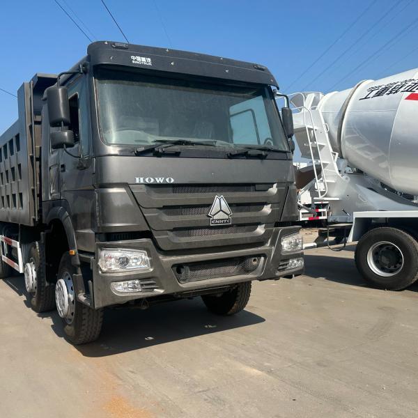 Sinotruk LHD Used Dump Truck Trader 40t Howo 371 375 horse power manual