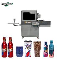 Imprimante UV rotative pour imprimer des bouteilles coniques et cylindriques avec double système d'alimentation automatique