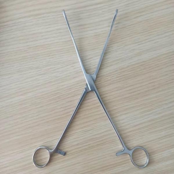 Хирургическая губка инструментов и оборудований больницы медицинская держа пинцет