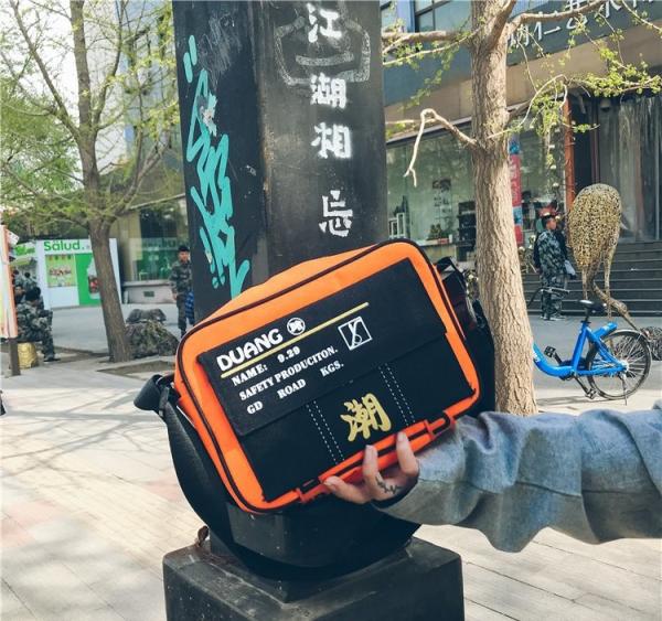 New men's and women's polyester waterproof shoulder bag slung personality street fashion bag