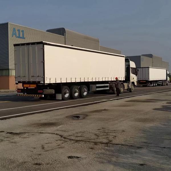 8.5t Grade Tri Axle Drop Side Curtain Van Trailer For Heavy And Large Cargo Transport
