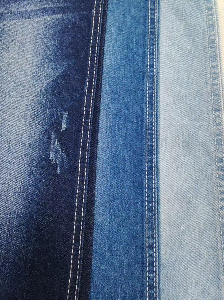 9.4 oz Super suave débil estiramiento 60% de algodón Twill estilo de tejido de denim para las vaqueros de dama