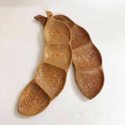 A natureza de madeira feito a mão do prato das placas do coco do tamarindo inspirou