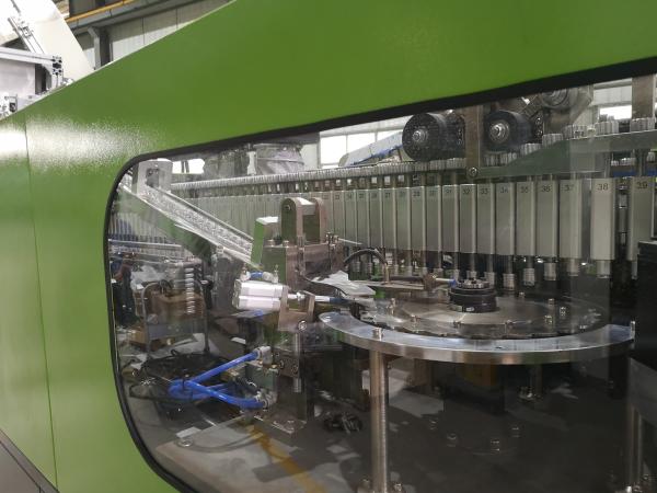 Low Noise 1 Litre Blow Moulding Machine 24000BPH 2.5Mpa~3.2Mpa Power Consumption