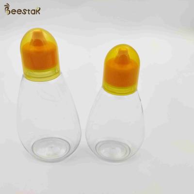 250ml 350ml 500ml Honey Jar And Spoon Plastic Honey Bottles vazio para o armazenamento do mel