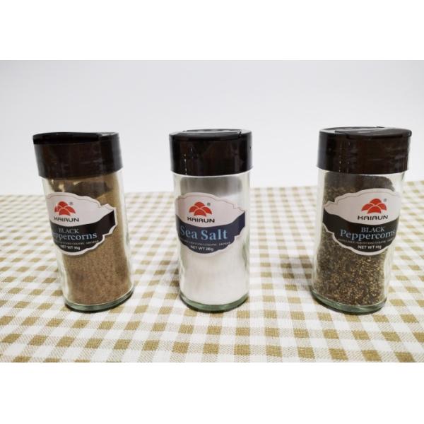 Jarrones redondos de vidrio de plástico con tapa giratoria para artículos esenciales de cocina