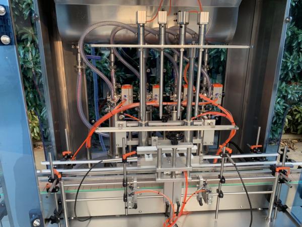 Mécanisme de remplissage des bouteilles / système de remplissage des bouteilles