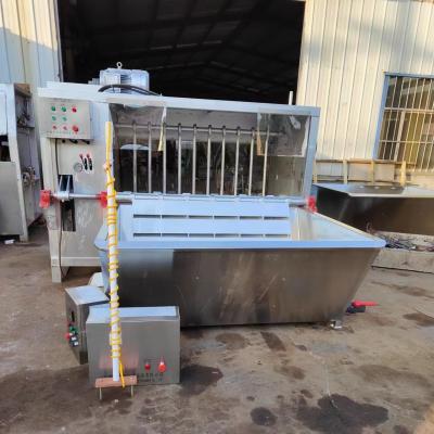 Machine de dépilation et de chauffage des porcs
