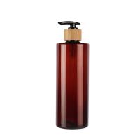 60ml 80ml 100ml 120ml 150ml 180ml 200ml 250ml 300ml Elegante Botella de PET Ambar de hombro plano con bomba de loción de bambú natural