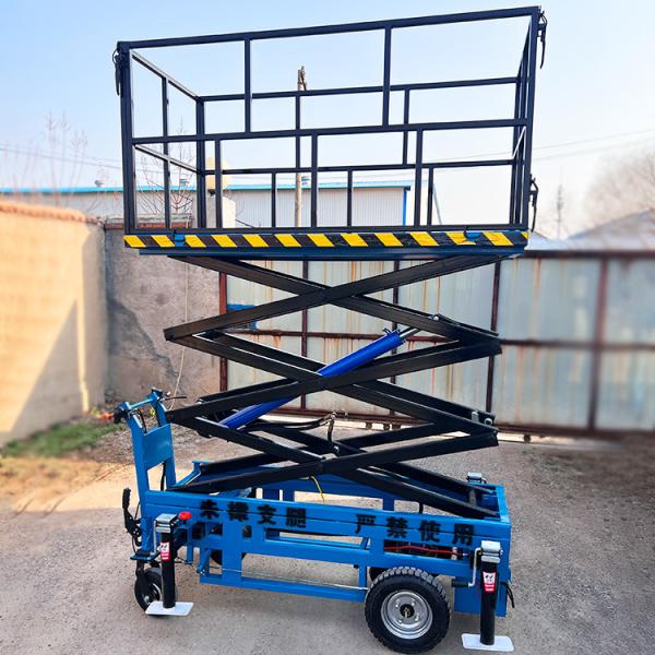 Factory Supply Mini Manual Battery Power Electric Push Around Scissor Lift Type Pulling Aerial Work Platform for Home Used