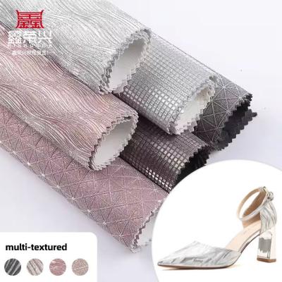 Tela de cuero sintético brillante con purpurina en relieve de PU elástico para zapatos, bolsos, lazos, manualidades, sombreros, tela de cuero sintético