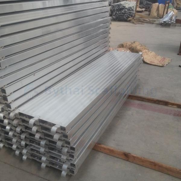 Non slip surface steel staging plank scaffolding platform constructed from heavy gauge steel ensuring safety and durability on job sites
