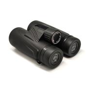 Prismáticos de alta potencia negros compactos de HD 10x42 para la observación de pájaros viajando