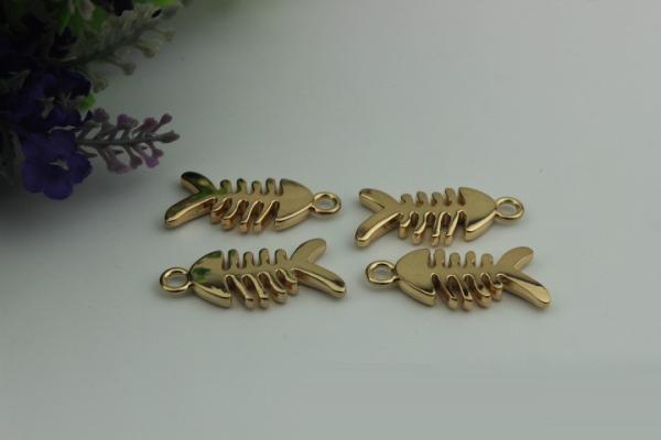 Small light gold fish bones pattern zinc alloy metal handbag logo label tags for sales