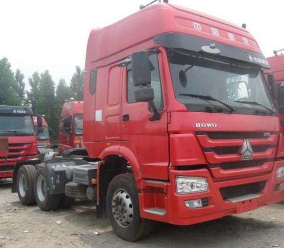 Sinotruk Howo tractors tow truck head / prime mover in RHD , LHD in best price L2000 long cab