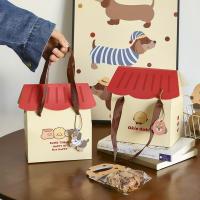 Boîtes cadeaux pour la maison sur le thème des adorables chiens avec rubans et poignées pour cookies, gâteaux et croustilles en forme de flocons de neige
