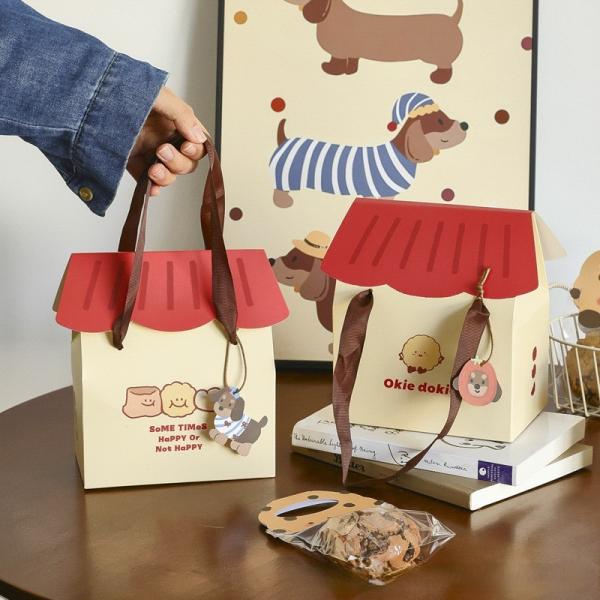 Boîtes cadeaux pour la maison sur le thème des adorables chiens avec rubans et poignées pour cookies, gâteaux et croustilles en forme de flocons de neige